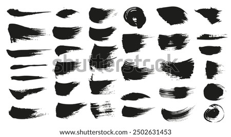 Abstract textured spots of black paint  big set  isolated on a white background . Image produced without the use of any form of AI software at any stage.
