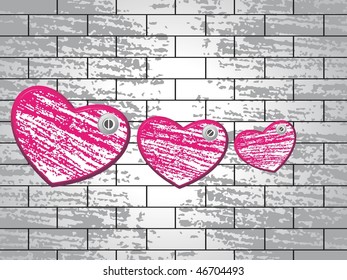 abstract three hearts with brick wall