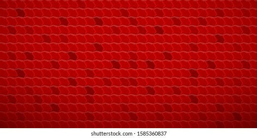 Abstract tiled background of polygons fitted to each other, in red colors