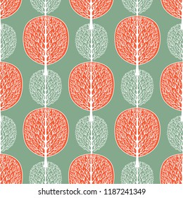 Abstract trees seamless pattern, vector illustration, stylized forest, vintage drawing. Ornate white tree trunks with branches and orange crown foliage on pastel green background. For fabric design