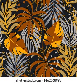 Abstract trend seamless pattern with bright tropical leaves and plants on a black background. Vector design. Jungle print. Floral background. Printing and textiles. Exotic tropics. Summer design.