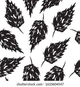Abstract trendy seamless pattern with silhouettes of floral elements.  Minimalistic style. Hand drawn leaves. Simple design illustration. Modern textile, branding, packaging. Monochrome texture.