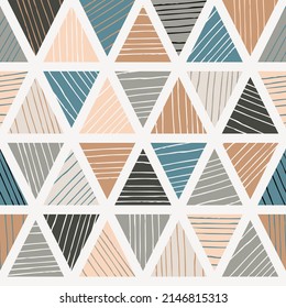 Abstract triangle geometric seamless pattern. Neutral trendy colors. Vector illustration.