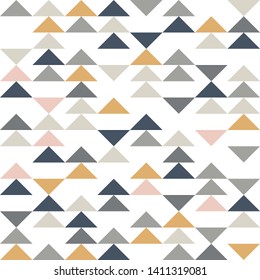 Abstract triangle seamless pattern. Vector geometric ornament in pastel colors. Simple print.