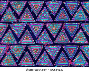Abstract triangles background. Colorful ornament background. Trendy boho background. Summer bright colors. Abstract doodle triangles background can be used for web design, wallpapers and prints.
