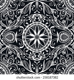 Abstract tribal ethnic background seamless pattern. Hand drawn geometric ornament. Can be used for card design, wallpaper, pattern fills, web page background, surface textures. Black and white