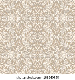 Abstract tribal ethnic seamless background, ornamental lace pattern hand drawn artwork, beige and white