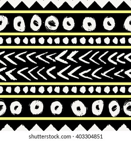 Abstract tribal seamless repeat pattern in black, neon yellow and cream. Modern and stylish abstract design poster, cover, card design.