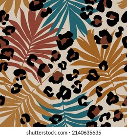 Abstract tropical floral seamless pattern with palm leaves silhouette, animal skin print. Creative background. Hand drawn vector art illustration for surface design, fabric, gift wrapping, wallpaper