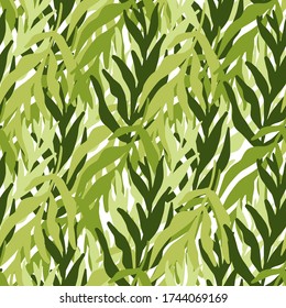 Abstract tropical leaf wallpaper. Jungle plants silhouette green leaves seamless pattern. Hawaiian design for fabric design, textile print, wrapping paper, cover. Fashion vector illustration