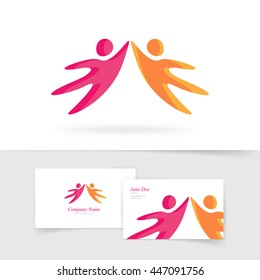 Abstract two people holding hands together vector logo element, red orange kids silhouette flying dancing logotype isolated on white, concept of community, family support, friendship creative emblem