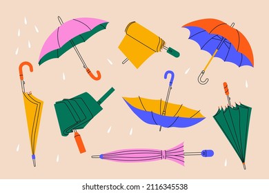 Abstract umbrellas. Set of hand drawn cartoon umbrellas, open, folded parasol, accessory for rainy days. Minimal vector art