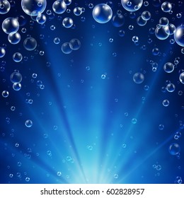 Abstract underwater background with sunlight and air bubbles