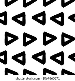 Abstract vector background with bold hand drawn triangles. Geometric seamless pattern