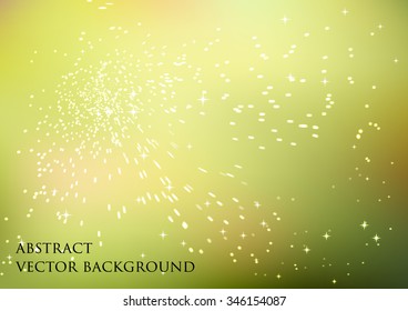 Abstract vector background with the effect of sparks and glitters