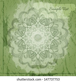 Abstract vector background. Fancy round ornament on textured green backdrop.