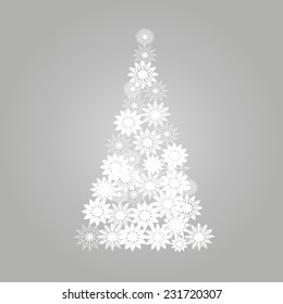 Abstract vector christmas tree from white snowflakes