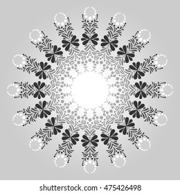 Abstract vector circular ornament in shades of gray. For your work.