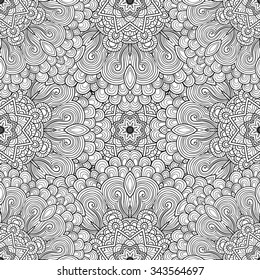 Abstract vector decorative ethnic mandala black and white seamless pattern.