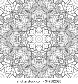 Abstract vector decorative ethnic mandala black and white seamless pattern.