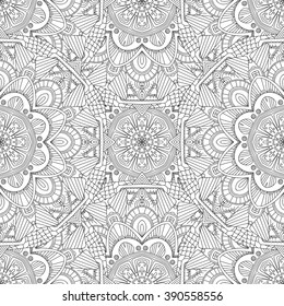 Abstract vector decorative ethnic mandala black and white seamless pattern.