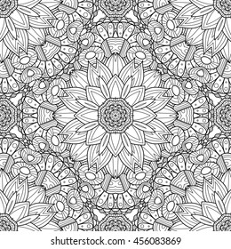 Abstract vector decorative ethnic mandala black and white seamless pattern.