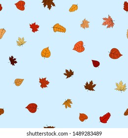 abstract vector doodle autumn leaves seamless pattern - leaves are falling from the light blue sky