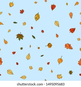 abstract vector doodle autumn leaves seamless pattern - leaves are falling from the light blue sky