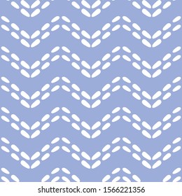 Abstract vector dotted chevron seamless pattern. Stitching effect background repeat in blue and white.