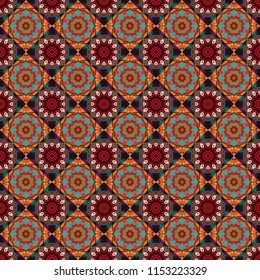 Abstract vector geometric seamless pattern with circles, lines and rhombuses in beige, red and black colors.