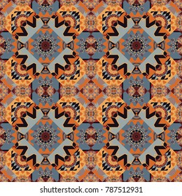 Abstract vector geometric seamless pattern with circles, lines and rhombuses in gray, orange and black colors.