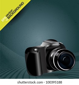 Abstract vector grunge background with digital camera and place for text