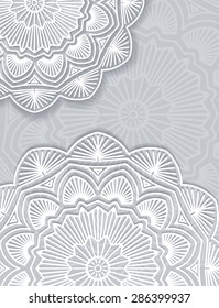 Abstract vector lace design with decorative mandala and copyspace in popular gray and white gamma.