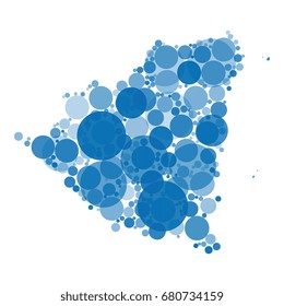 abstract vector map of nicaragua filled with circles of different diameters and shades of color isolated on white background