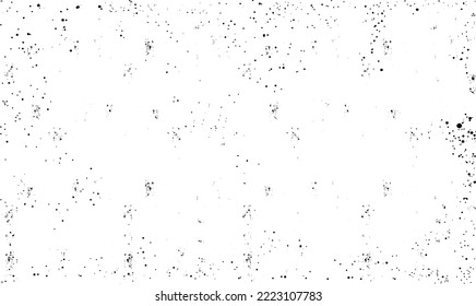 Abstract vector noise. Small particles of debris and dust. Distressed uneven background. Grunge texture overlay with rough and fine grains isolated on white background. Vector illustration. EPS10.