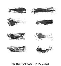 Abstract vector paint smears set. Hand drawn design element. Black ink marks on white background. Grunge texture.