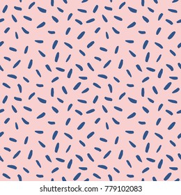 Abstract vector pattern with brush strokes, lines, sprinkles, confetti. Hand drawn seamless background in Memphis style.