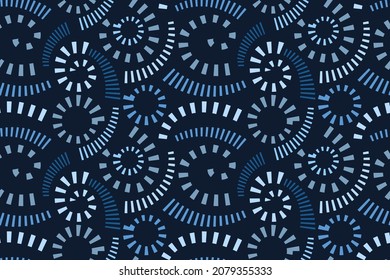 Abstract vector seamless design. Striped curls isolated on a dark blue background. A repeating spiral pattern for use in wallpapers, cards, banners, gift wraps, and more.