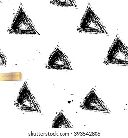 Abstract vector seamless pattern. Artistic fabric print design. Messy grunge brushed triangles endless pattern. Black triangles on white background.