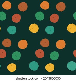 Abstract vector seamless pattern with colorful circle on the dark green background. Textured by rough brush to worn, vintage effect. For wallpaper, textile, interior decor, wrapping, packaging 