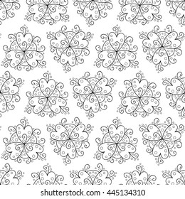 Abstract vector seamless pattern with flowers, leaves and swirls. Black and white background.