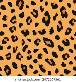 Abstract vector seamless pattern of leopard fur. Jaguar, cheetah, panther skin print. Spotted pattern with black border and orange center on a light orange background. Good for fashion print designs.