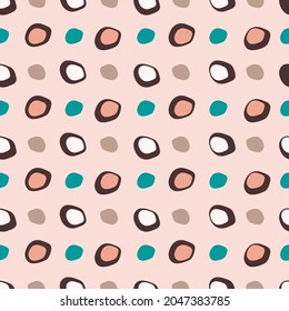 Abstract vector seamless pattern with regular repeating grain shapes on the pink background. Cute kids caramele cover . For textile, wrapping, packaging, fabrics and other design.