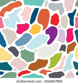 abstract vector seamless stain pattern in trendy 2022 colors. bright and colorful. for fabric, wrapping paper and background in design.