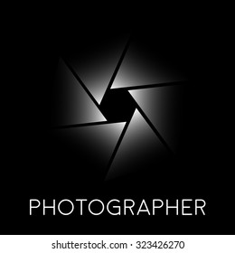 Abstract vector sign photographer, diaphragm on black background