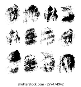 Abstract vector spots of black ink on white background