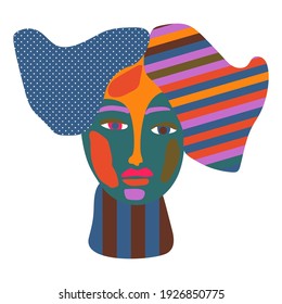 Abstract vector woman or girl portrait. Surreal human face illustration. Digitally created female head in bold colors, simple geometric shapes and patterns.
