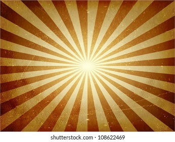 Abstract vintage background with light burst in golden brown. Grunge elements give it a textured and aged feeling.