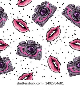 abstract vintage background with lips and camera on black dots pattern, seamless vector illustration