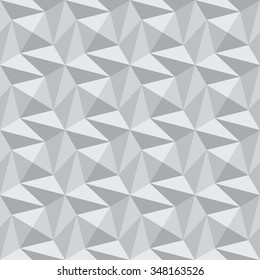 Abstract volumetric seamless pattern. Monochrome gray polygonal background. Faceted surface repeating background.